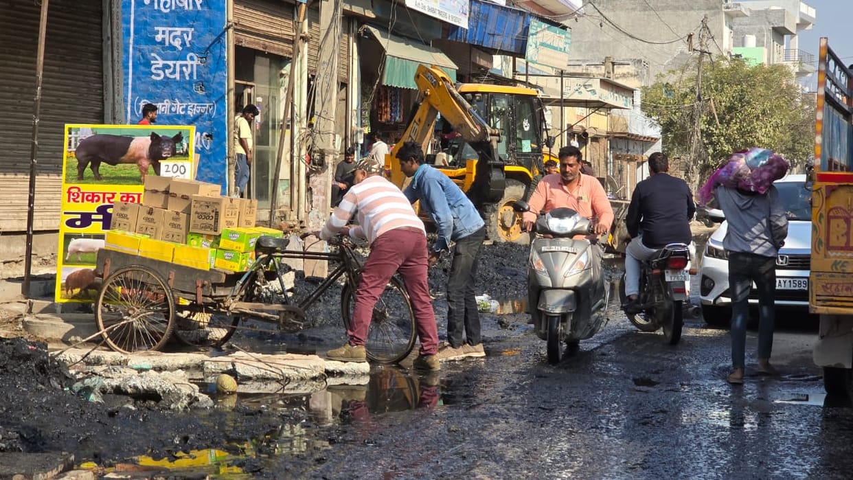 People are troubled by the failure to remove silt from the drains on Kacha Badli Road.