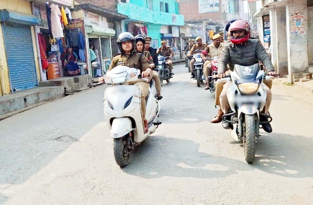 The SP Rural inspected the procession route in Baragaon on a scooter.