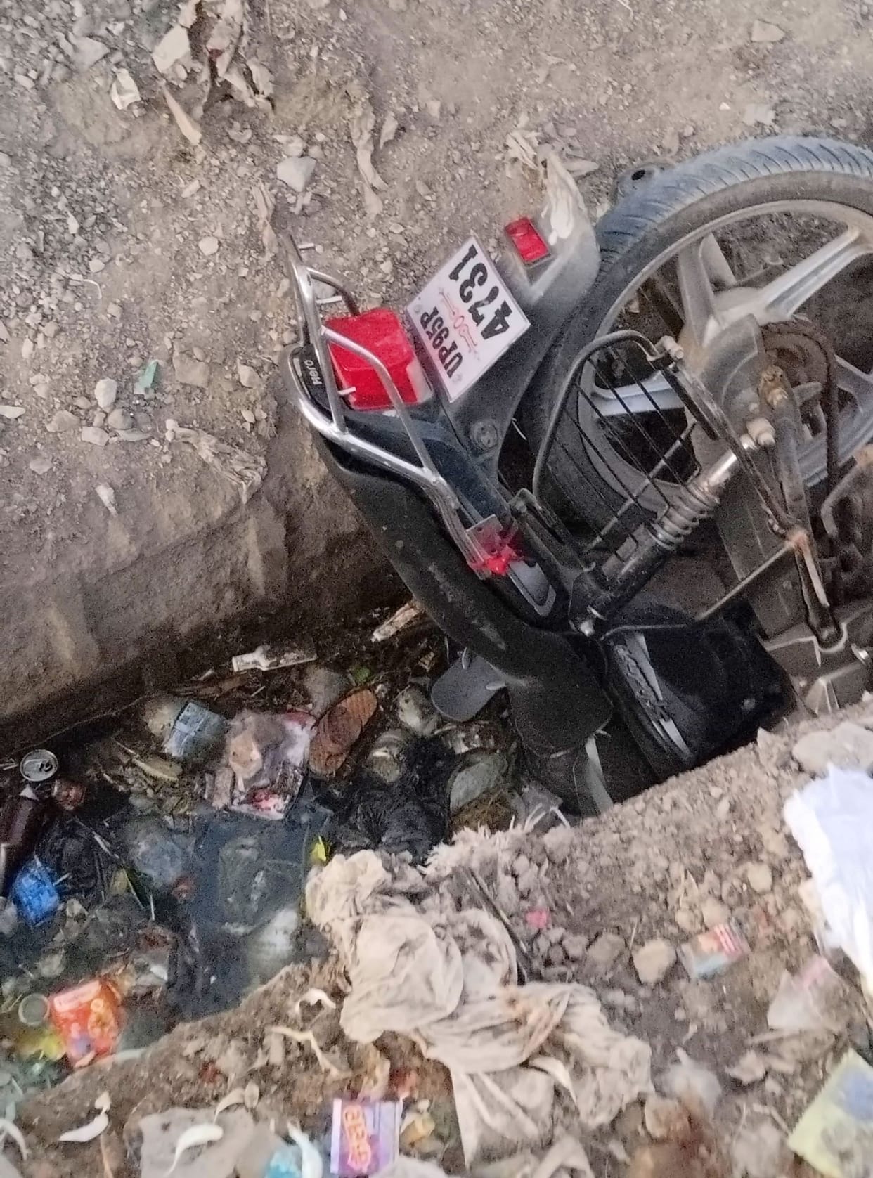 The driver and his bike fell into an open drain, his condition is critical.