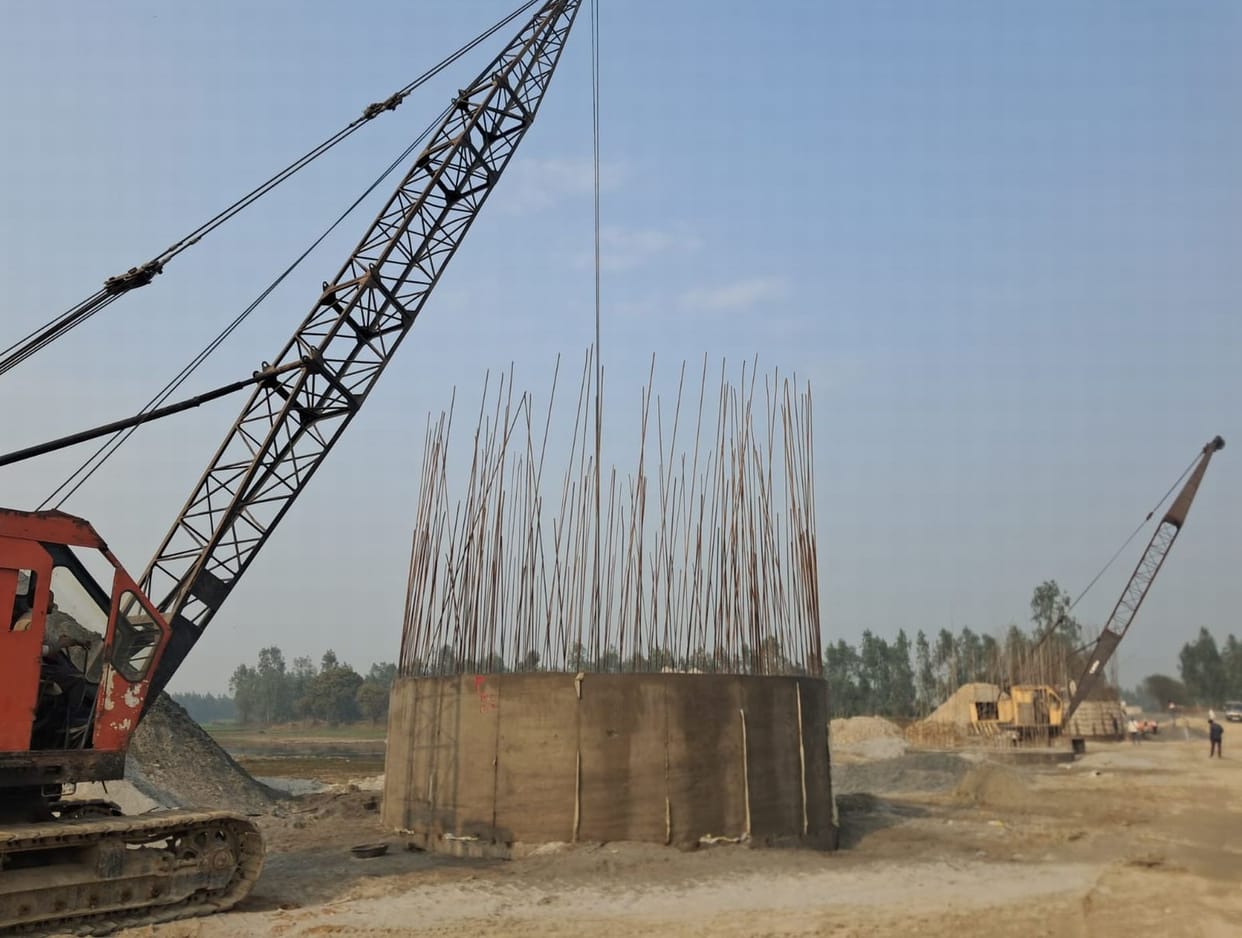 Only 30% of the bridge over the Mahawa River has been completed in seven months; how will it be completed by June?