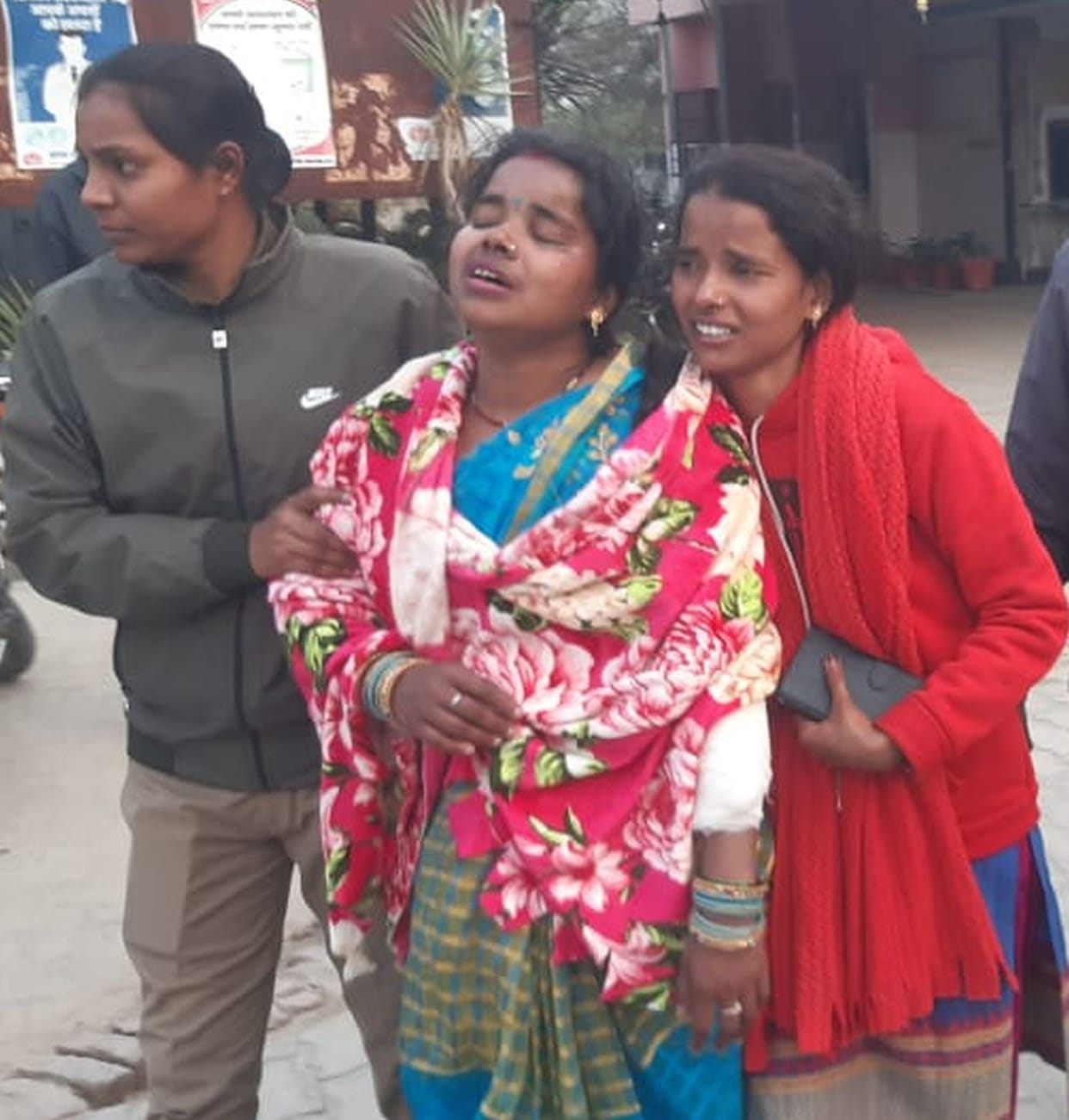 Infant child slips from mother's hands, crushed by truck