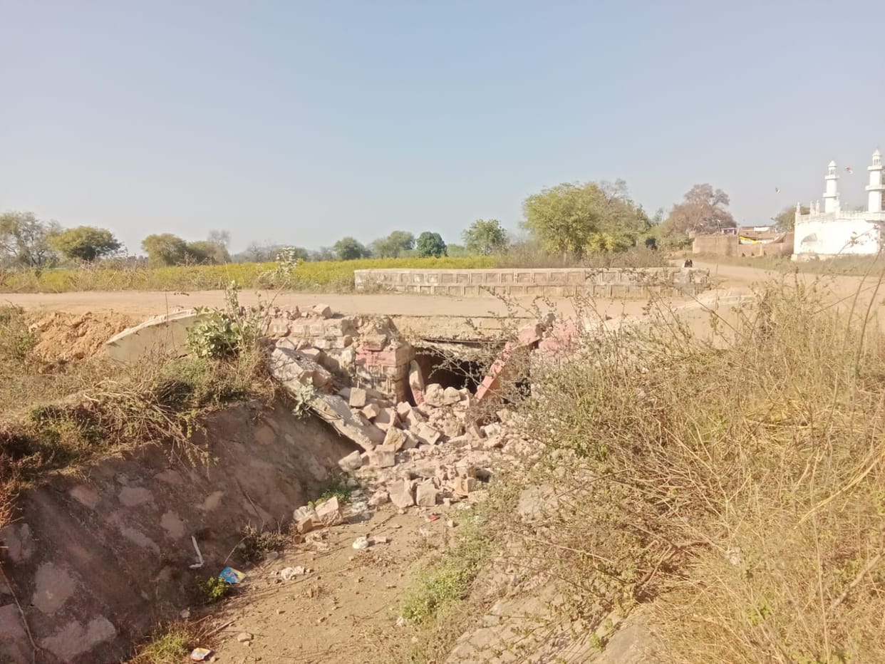 Minor's safety wall broken due to operation of overloaded trucks