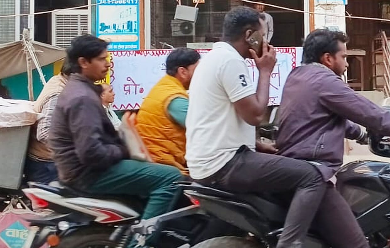 Traffic rules are being ignored, drivers are riding without helmets.