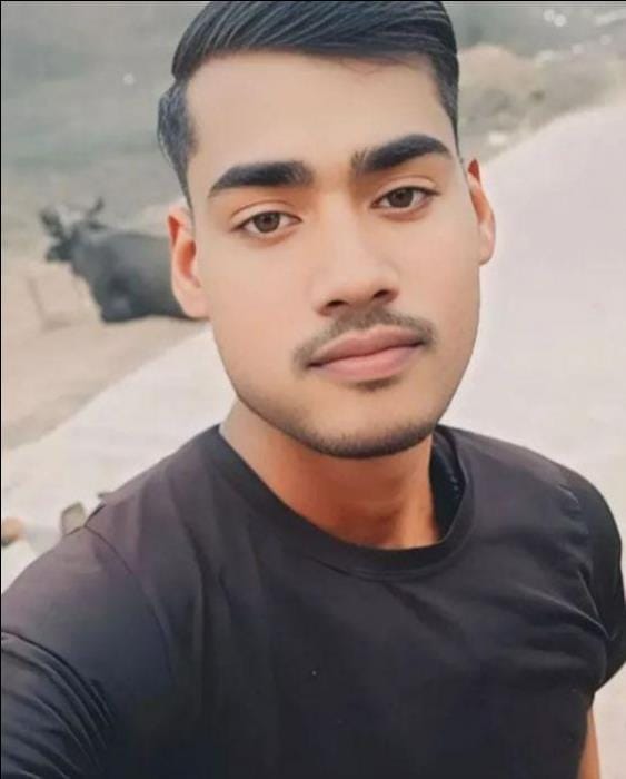 The body of a young man was found hanging from a noose in the cattle shed