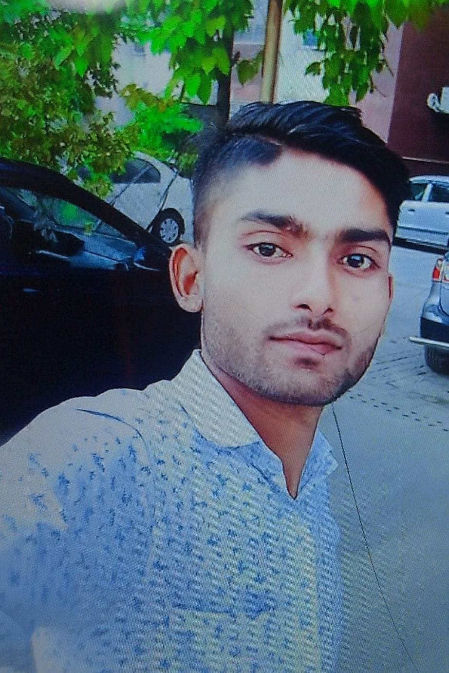 Grocer's body found hanging in garden
