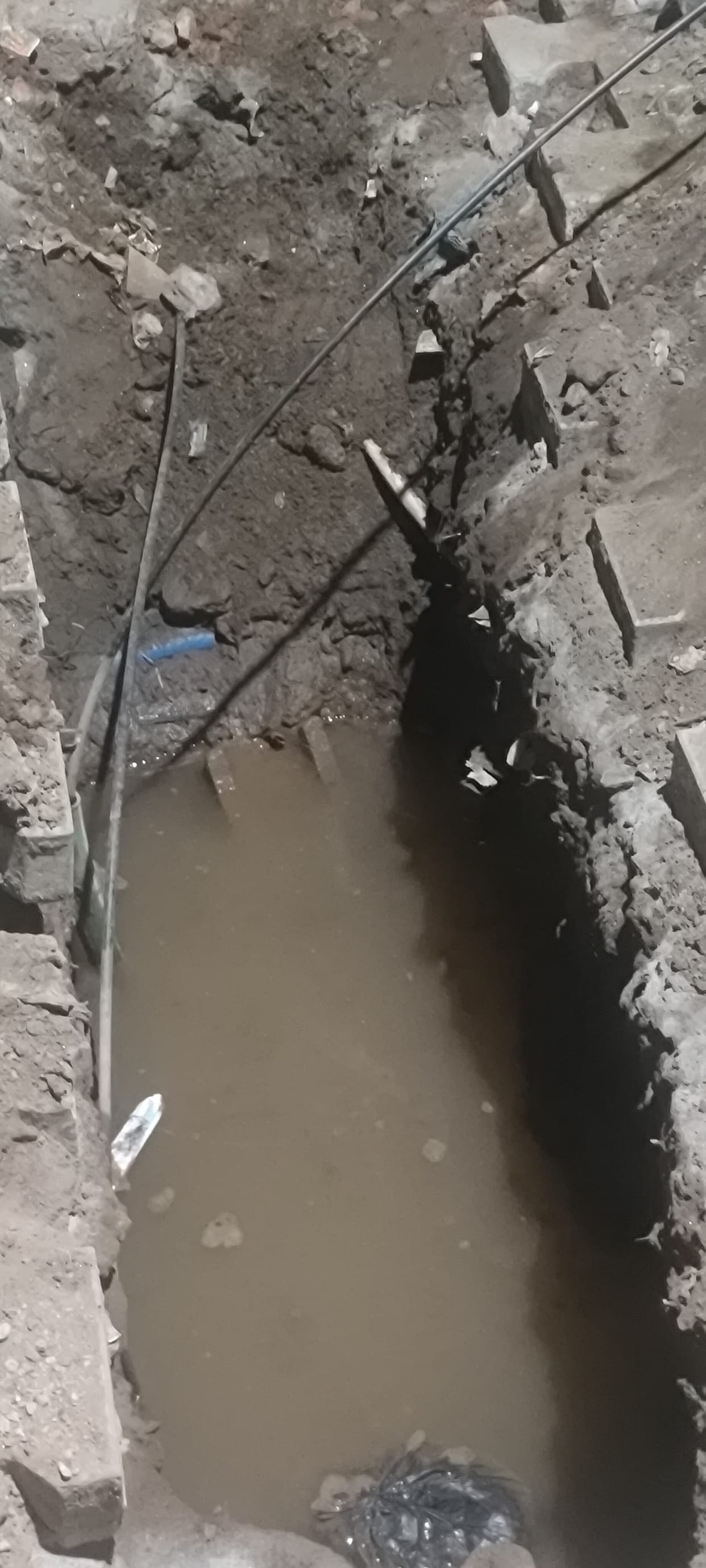 An open pit in Islam Nagar.