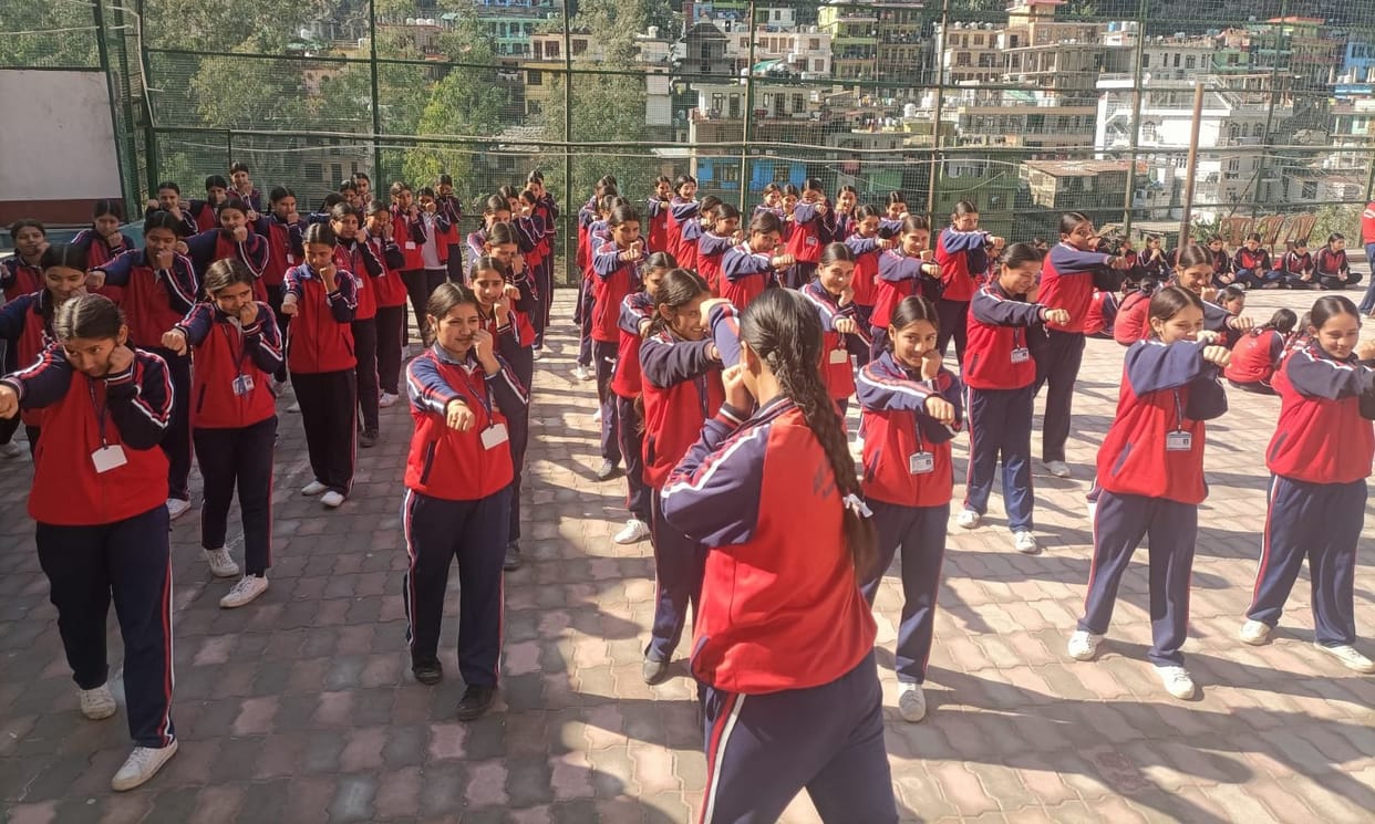 Girls of Rampur Girls School are learning self-defense techniques.