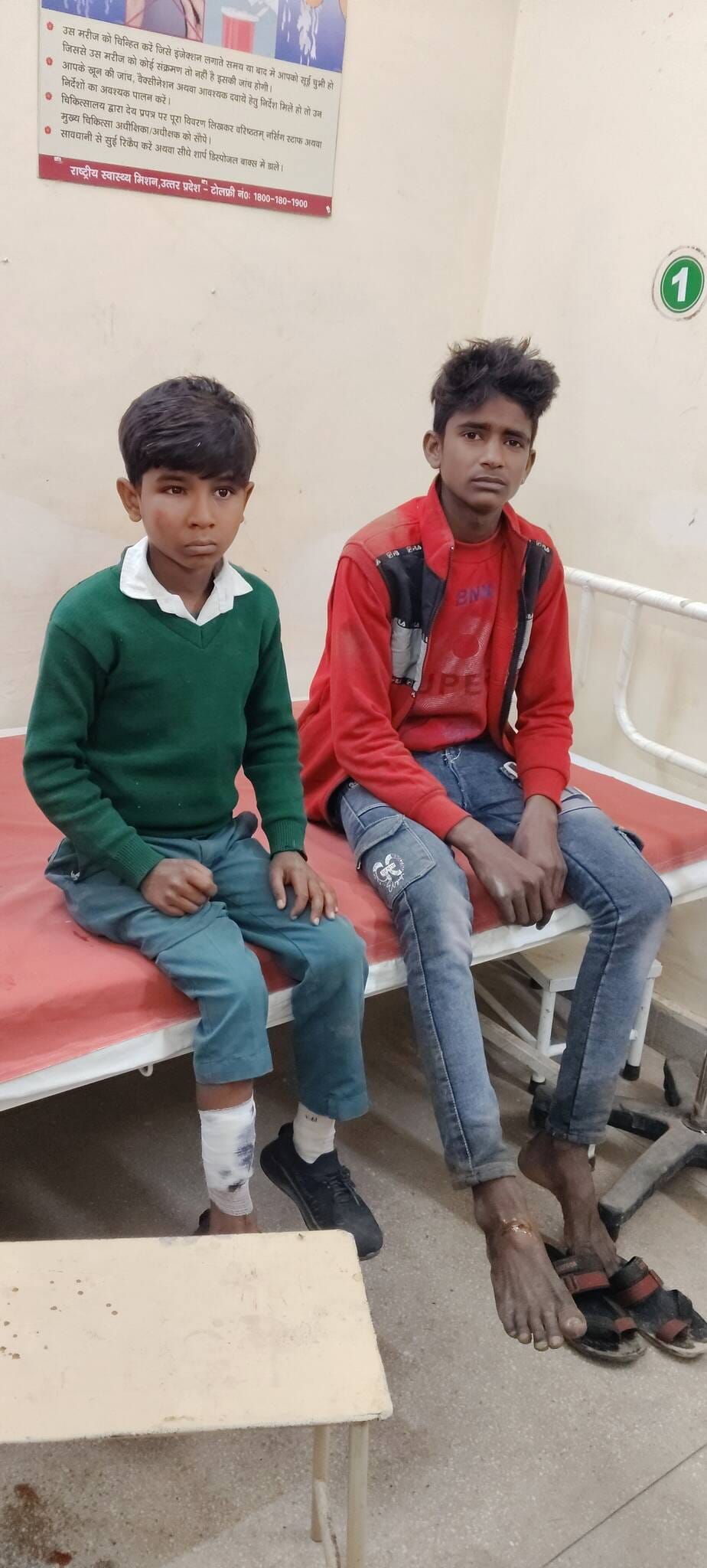 Two students riding a bike injured in an accident