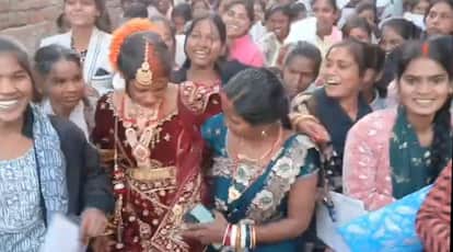 Bride arrives for exam in wedding attire in Jehanabad Bihar crowd gathers to see newlywed
