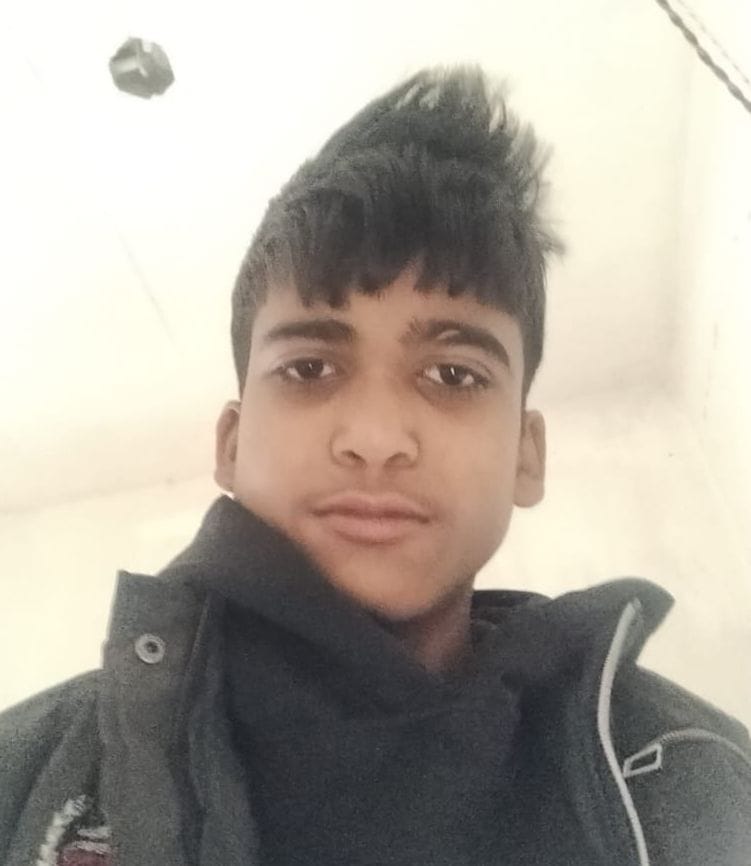 A teenager walking on the road was hit by a speeding car and died.