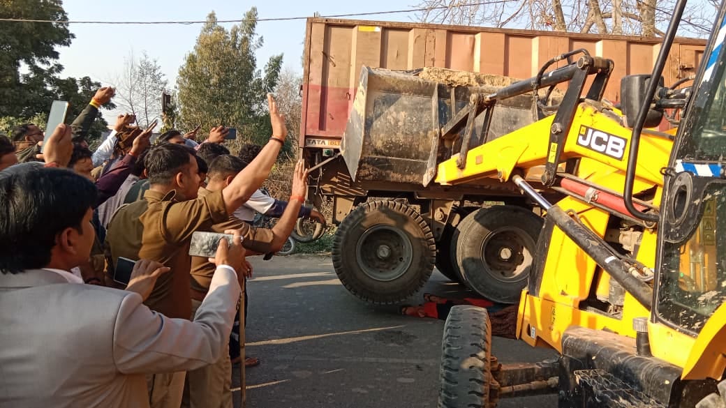 Woman crushed to death by trailer, husband injured