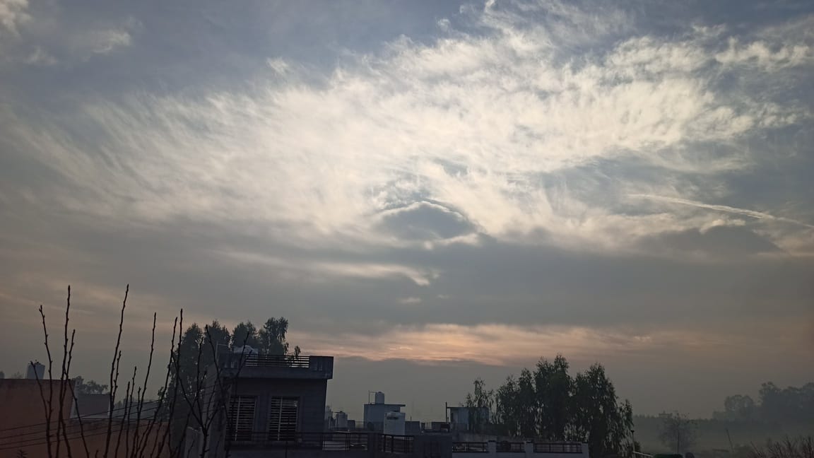 The temperature dropped by two degrees due to the clouds, and the sunshine had no effect