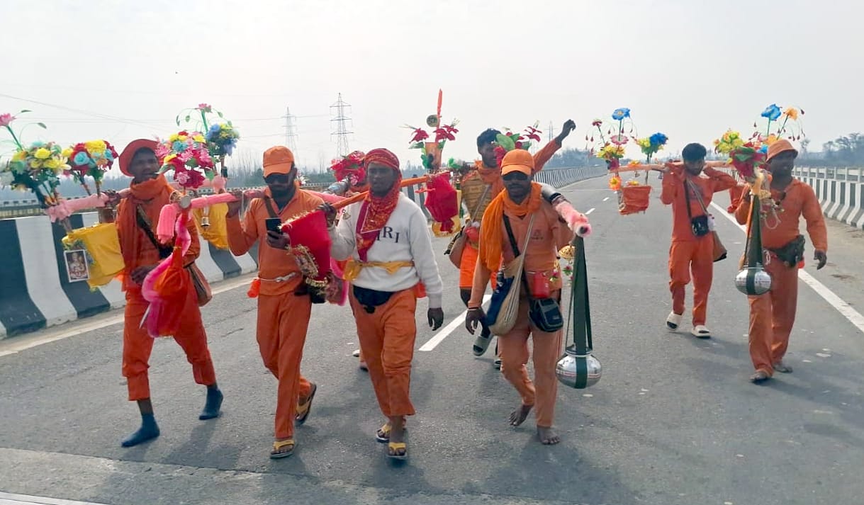 A wave of faith surged, Kanwariyas moved ahead with the chant of Bol Bam.