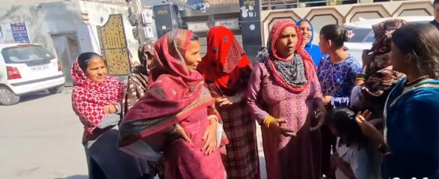 Women protest over the unavailability of oil and sugar at the depot, demand a separate depot