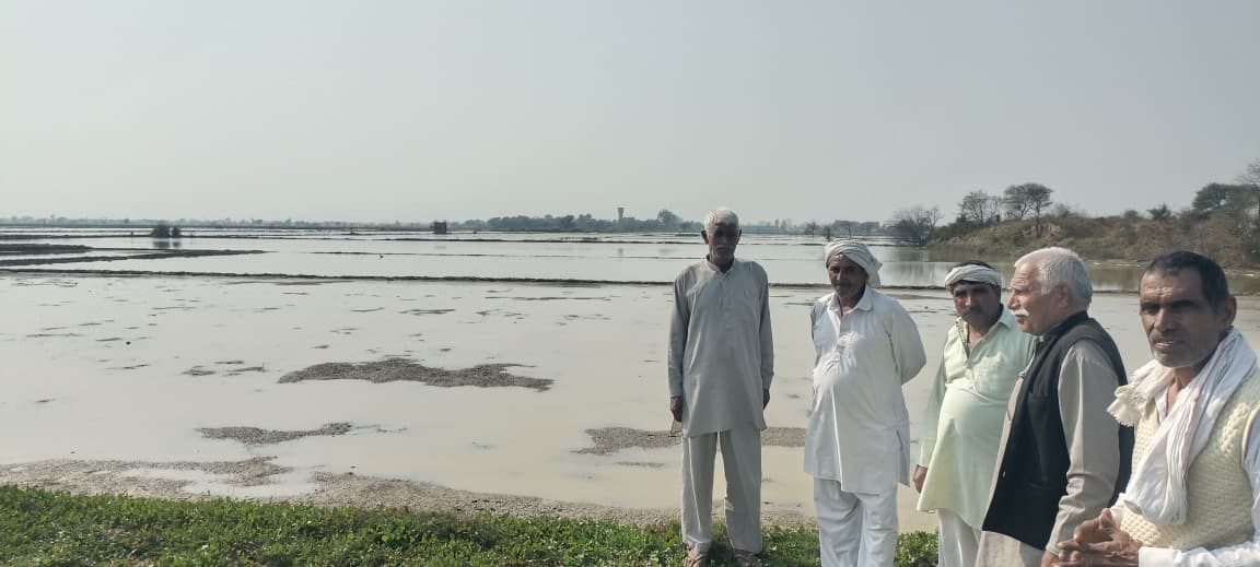 Farmers demanded compensation for relief from waterlogging on agricultural land.