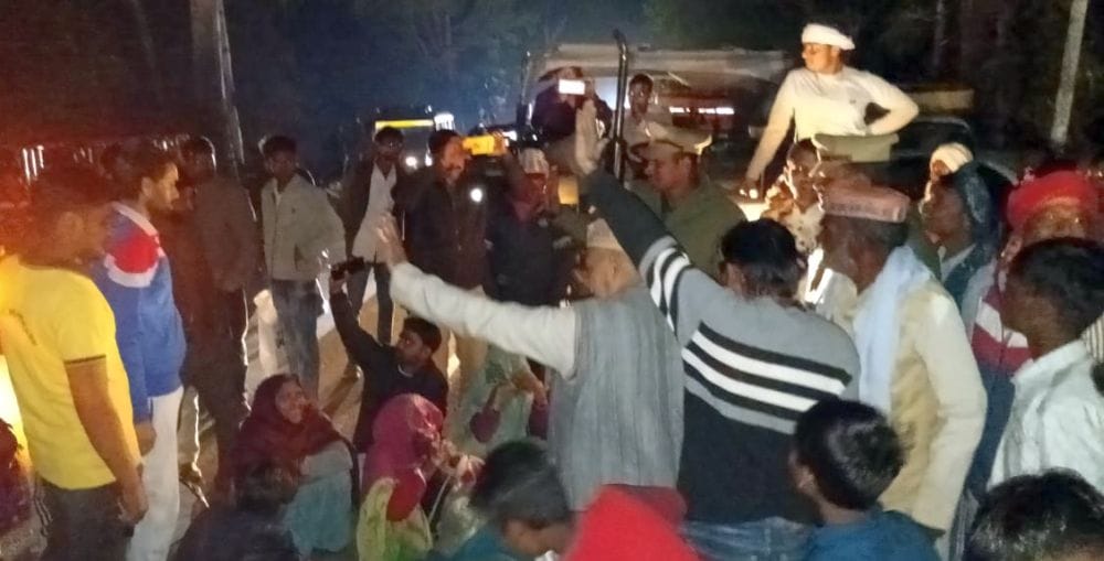 Angered by the power outage for four days, villagers blocked the road.