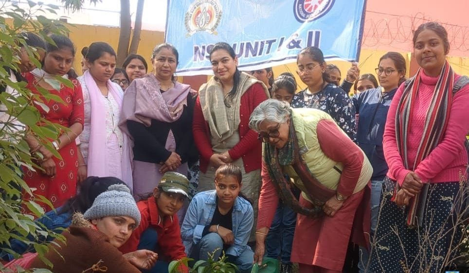 The volunteers planted trees along with the Principal.