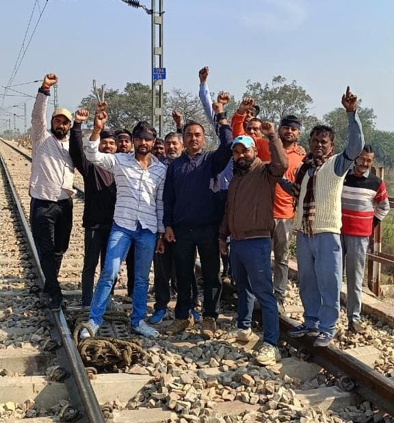Railway workers wear black bands and protest against labour laws