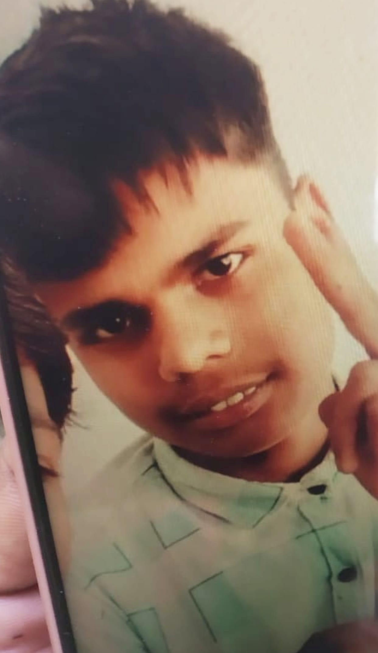 The body of a teenager missing for three days was found hanging.