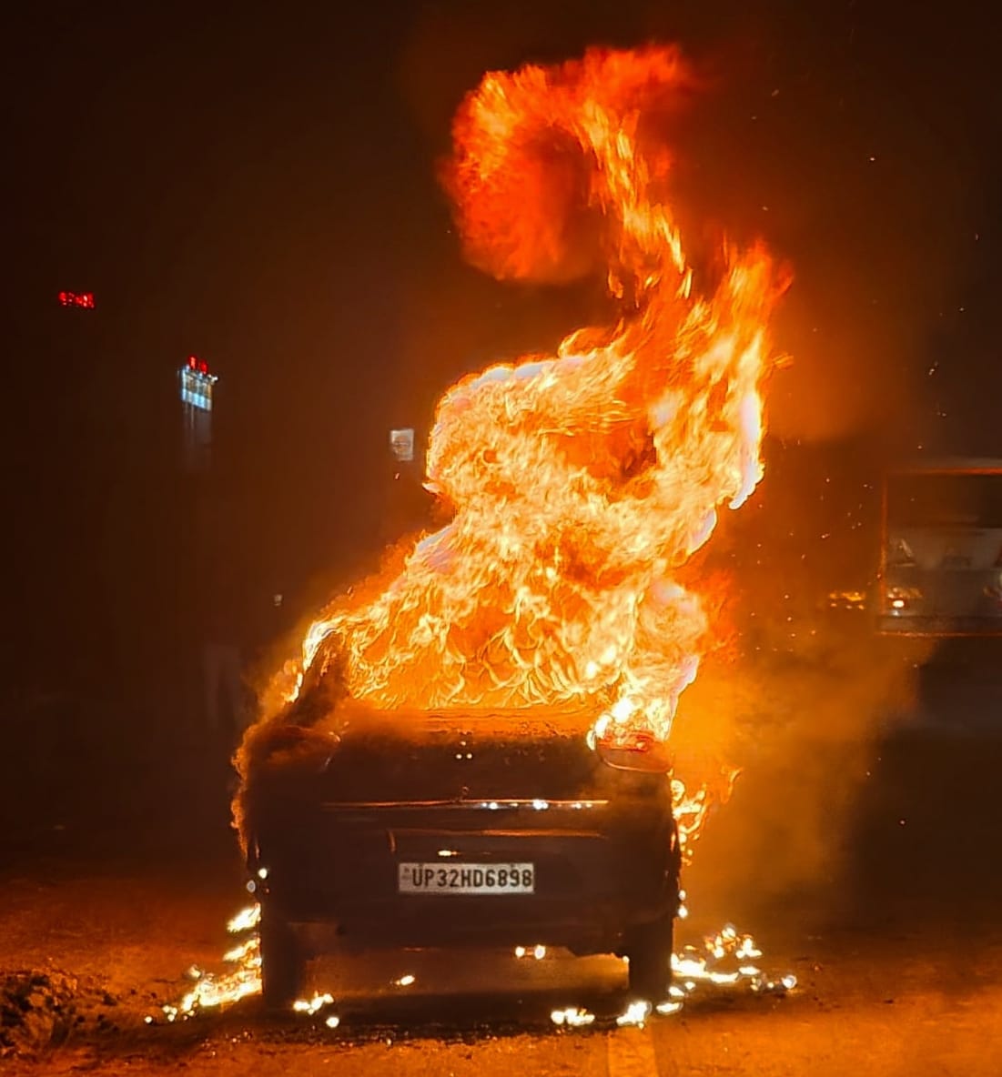 A car on the highway burst into flames
