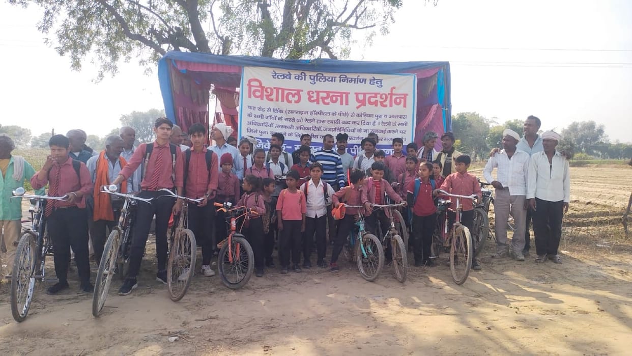 Students protest for the ninth day in support of villagers, demanding construction of roads