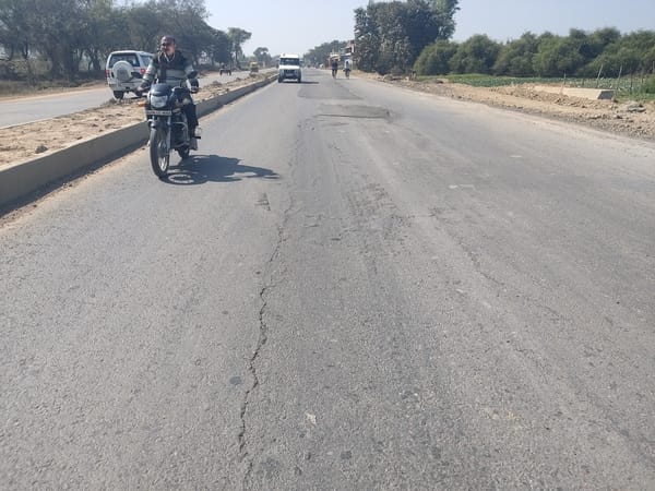 The four-lane road between Airport and Kaushambi started cracking, raising questions about those responsible.