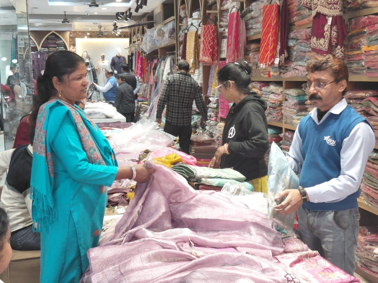 The market for light clothing has increased, with young women demanding jeans and tops.