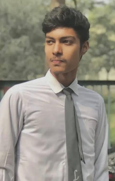 Student dies after bike collides with parked truck