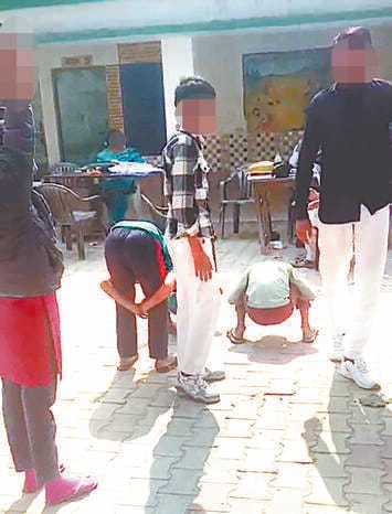 The principal of a government school in Falavada was accused of beating children by making them stand like a rooster.