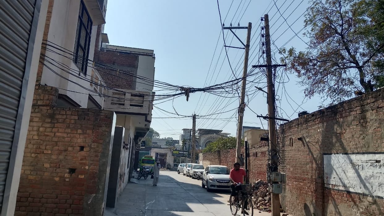 Downed power lines in residential areas of the city pose a risk of accidents.