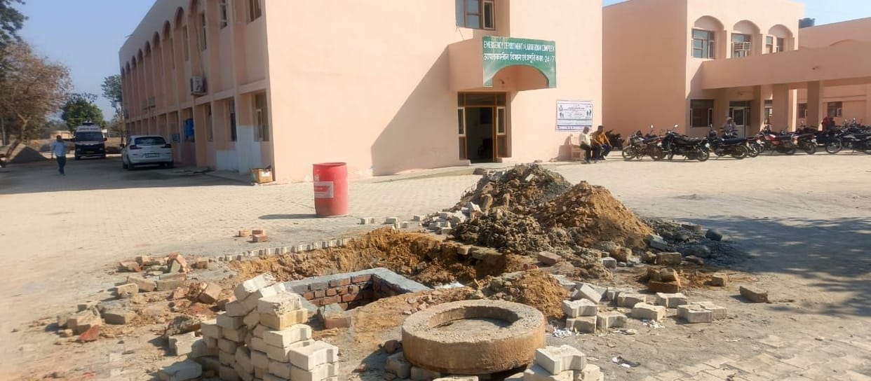 Open manhole inviting accidents in community health center