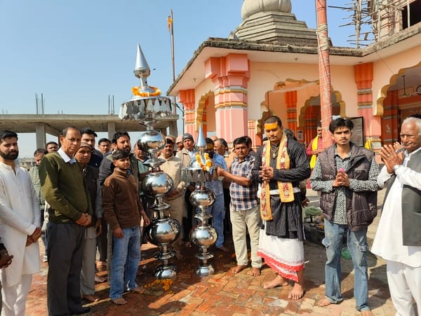 Kalash installation on the dome of the newly constructed Hanuman temple in Ramsaran Majra