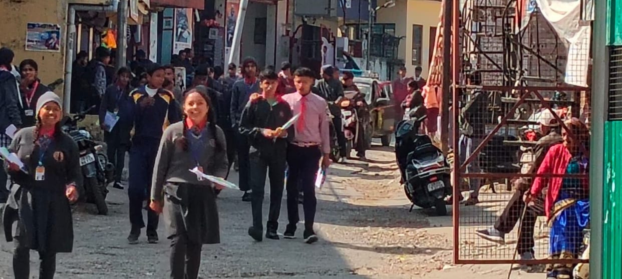 Children's faces lit up after doing well in their maths exams.