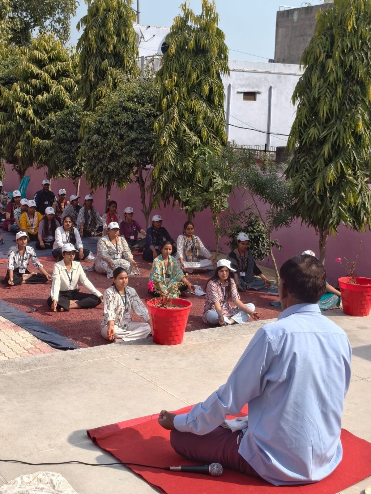 The importance of yoga was explained to the volunteers.