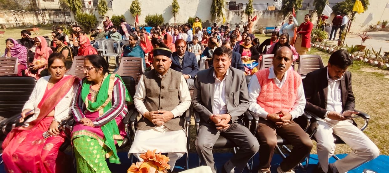The students took blessings from their parents by applying tilak and touching their feet.