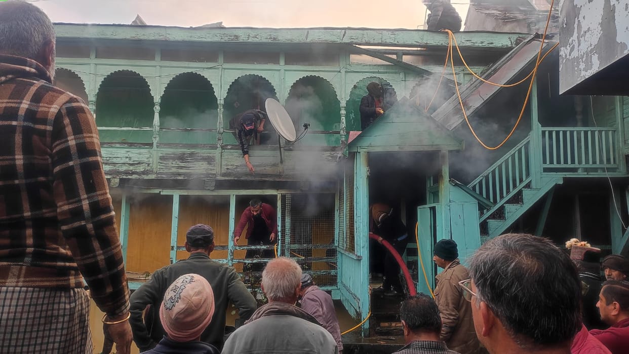 The three-storey house of the former head of the village burnt down in Kyari village