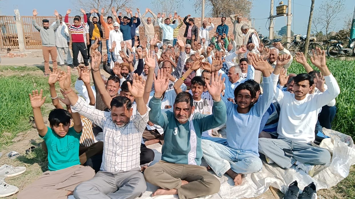 Villagers came out to protest against the construction of poultry farm in the village.