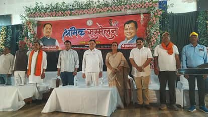 Workers conference held in open auditorium workers given cheques for resources and funds in Korba