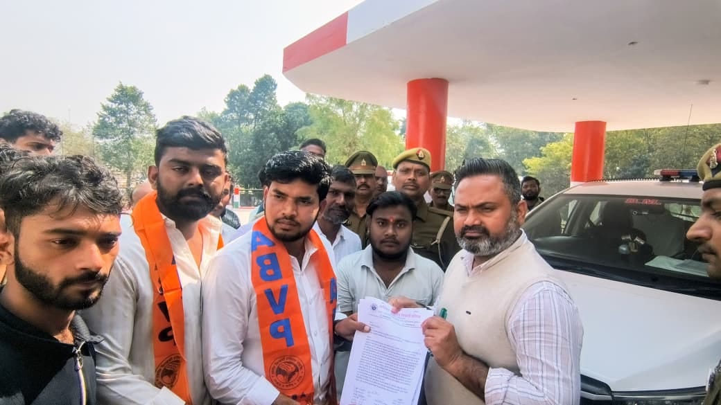 ABVP workers protested at the Collectorate demanding action against the nodal officer and clerk.
