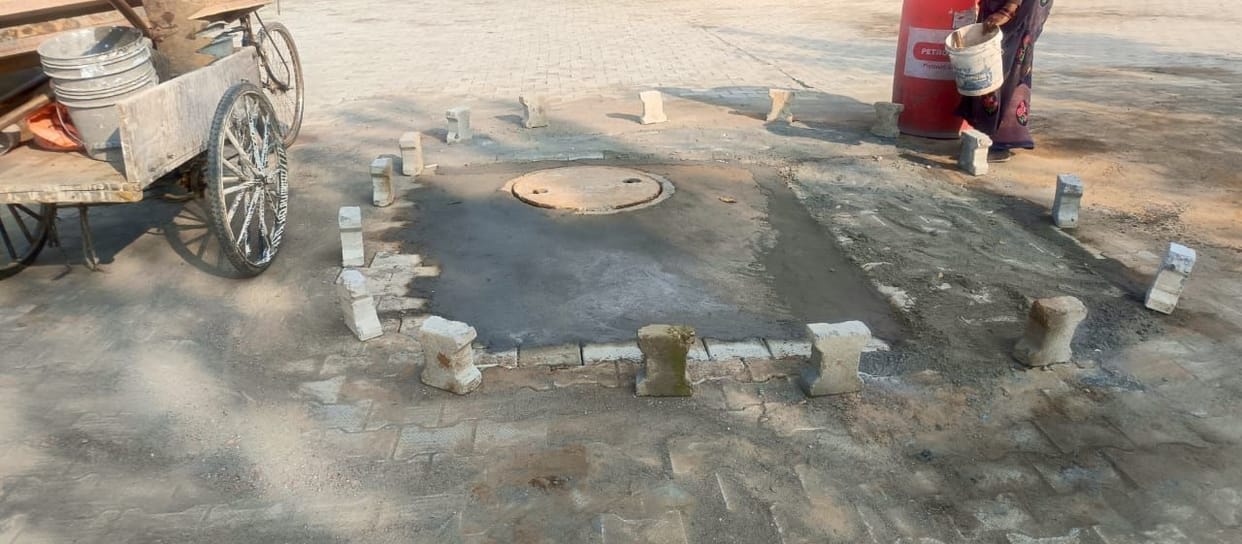 Open manholes closed and covered with lids, providing relief to patients and doctors