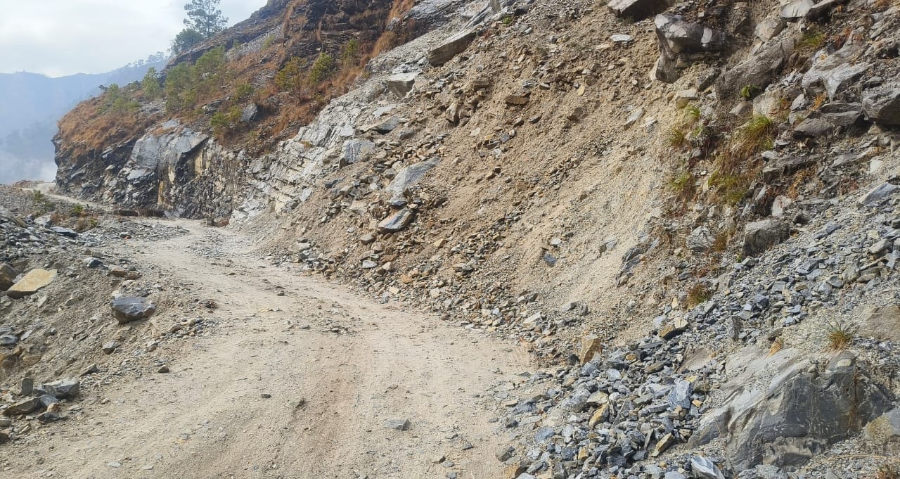 Boulders hanging from the hill on the Bangapani-Darma road pose a threat.