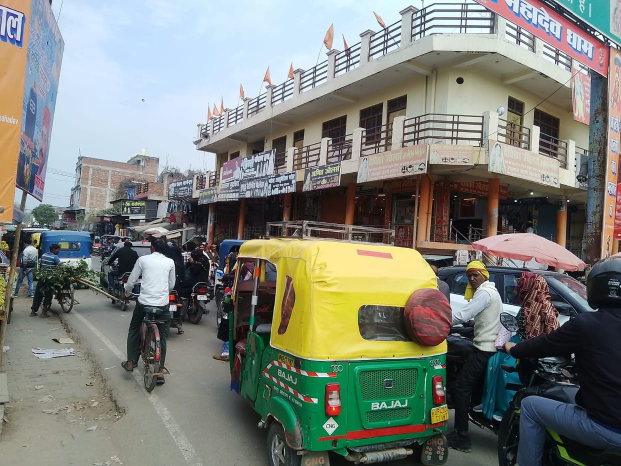 Occupying the road, missing the footpath, jammed all day