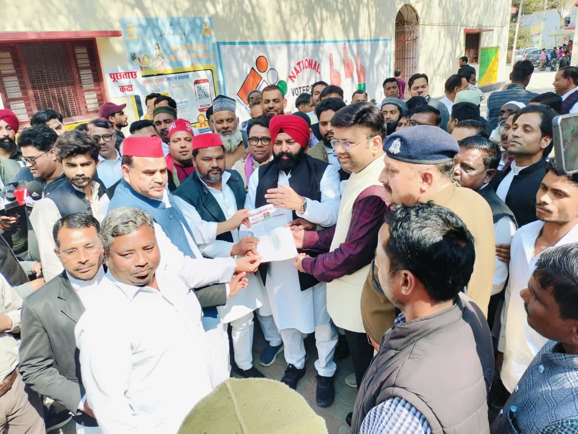 SP workers, enraged by the district vice-president being sent to jail, staged a protest at the Collectorate.