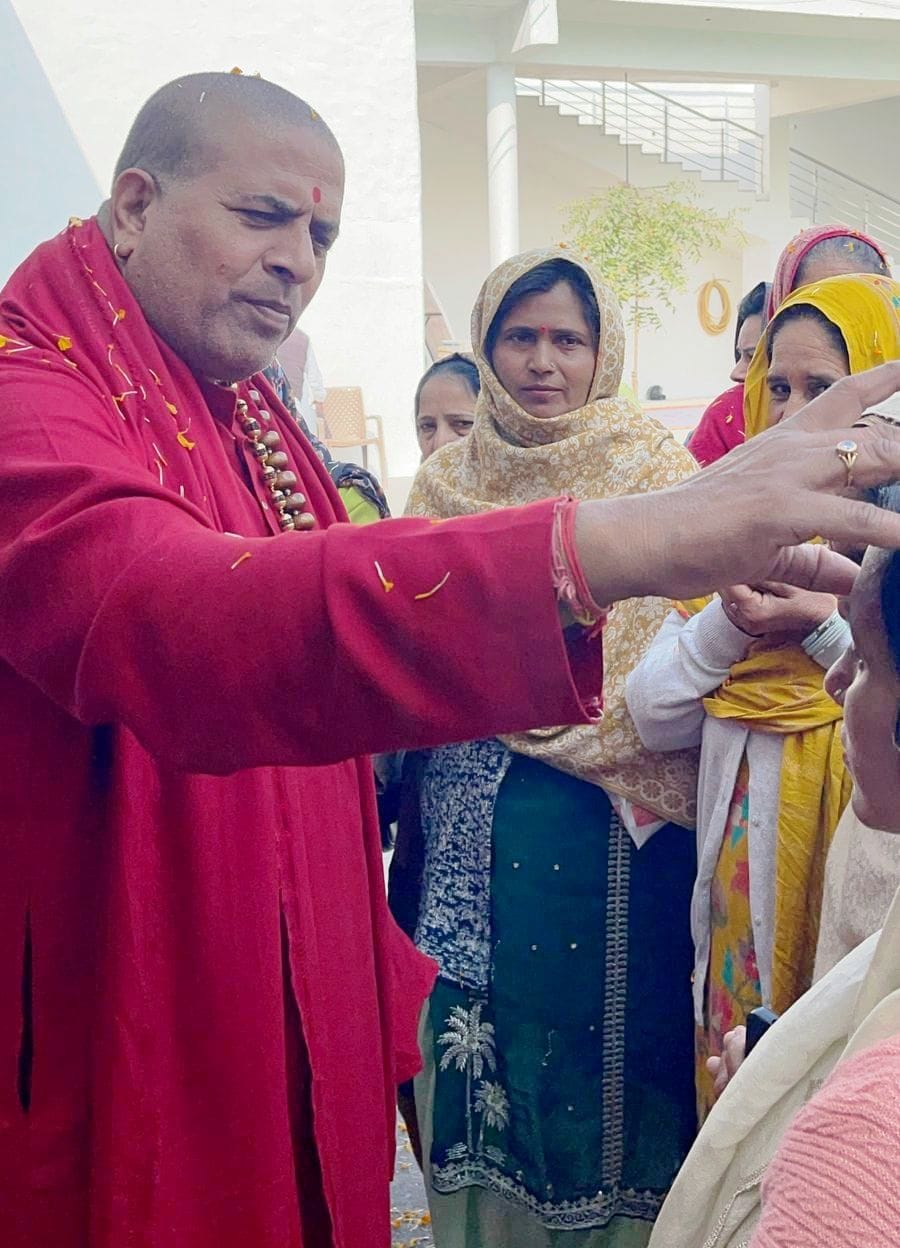 Devotees showered flowers to the tune of bhajans on Phulera Dooj at Jag Jyoti Darbar