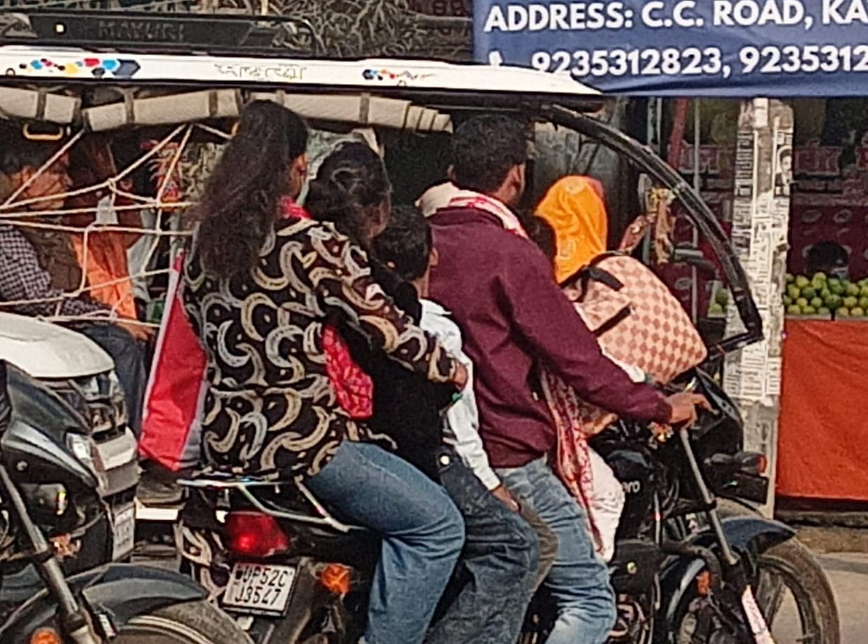 Five people on one bike... no worries about rules, no love for life