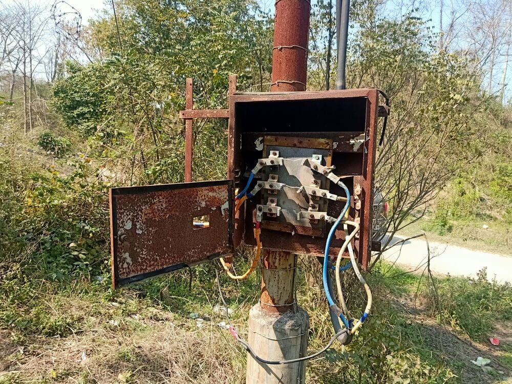 The open box of the high voltage transformer is inviting a major accident.