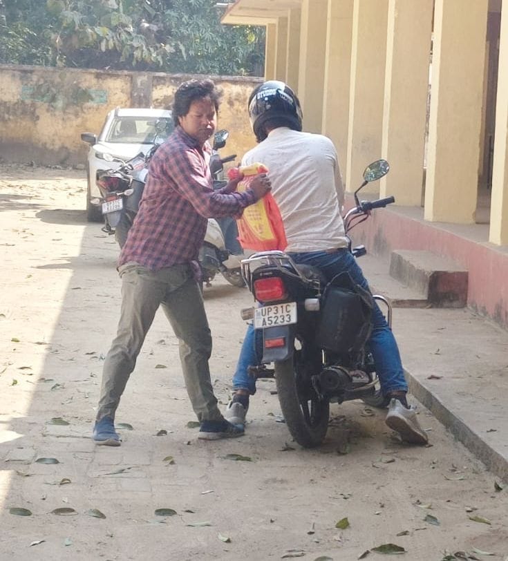 Answer sheets are being transported to the centre by bike and scooter.