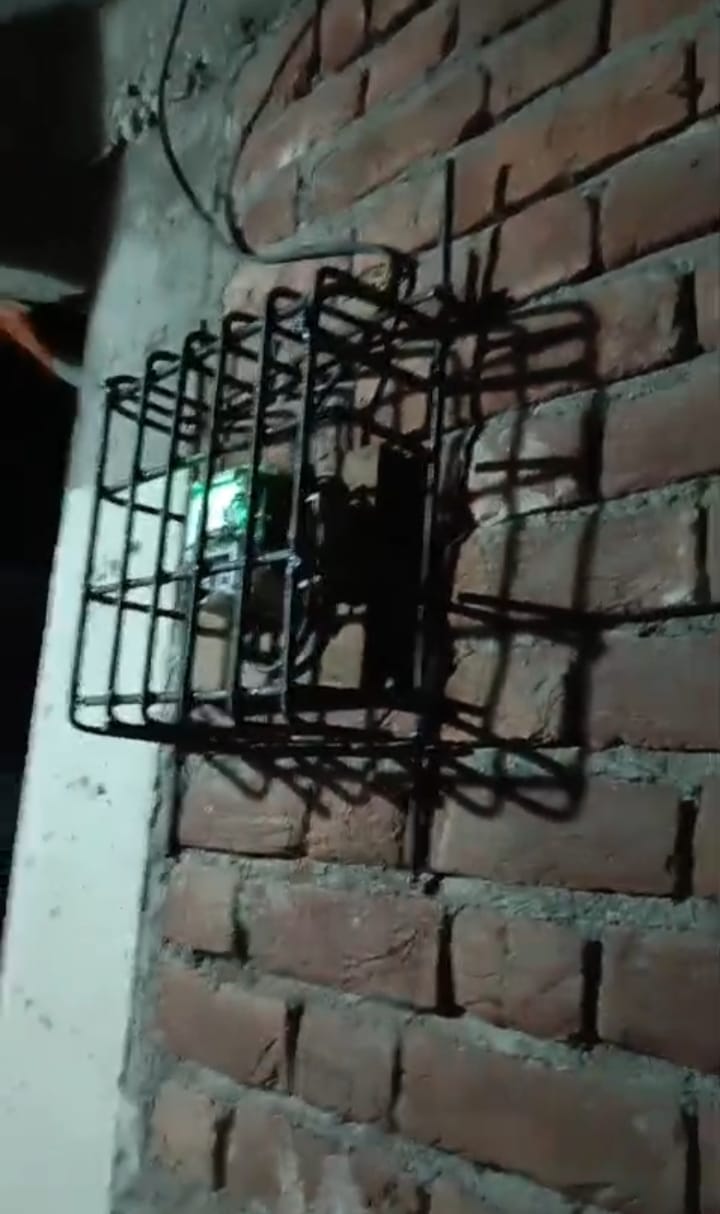 Unique protest: Electricity meter locked in iron grill in Kharbad