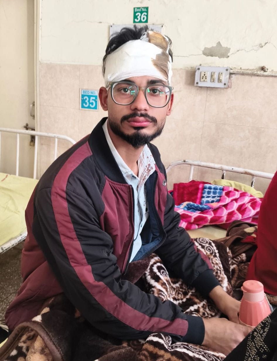 Bike-riding youths attacked a medical operator, injuring two including his son.