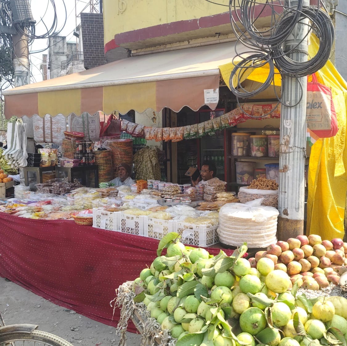 The market is abuzz with festive colours, bringing happiness to customers.